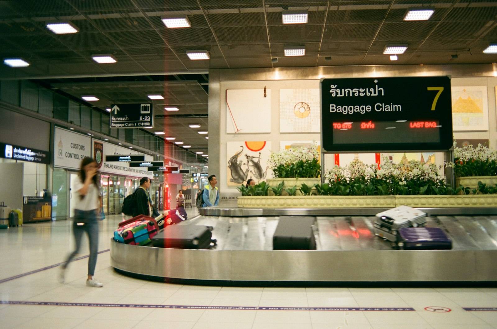 Airport baggage claim hall with a luggage carousel